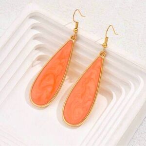 Dangling orange earrings